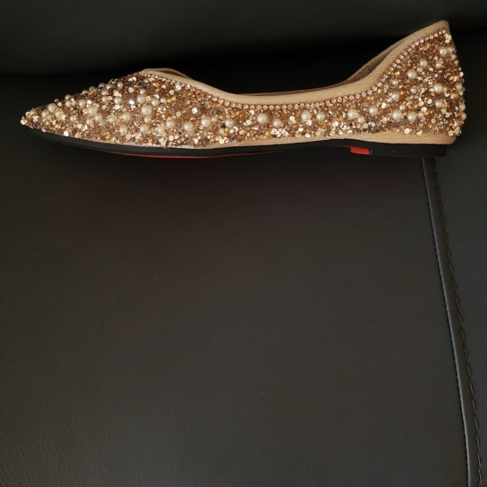 Womens size 8.5-9 flat gold colored w /pearls red bottom comfortable shoes